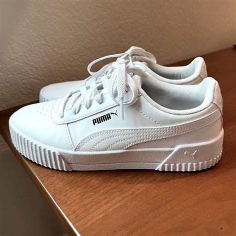 puma soft foam white sneakers.